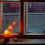 picture of a candle and a wooden window