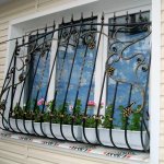 Wrought iron grille on the window