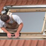 Installation of Velux roof window in metal tiles