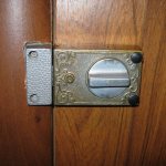 Overlay type lock on a wooden door leaf